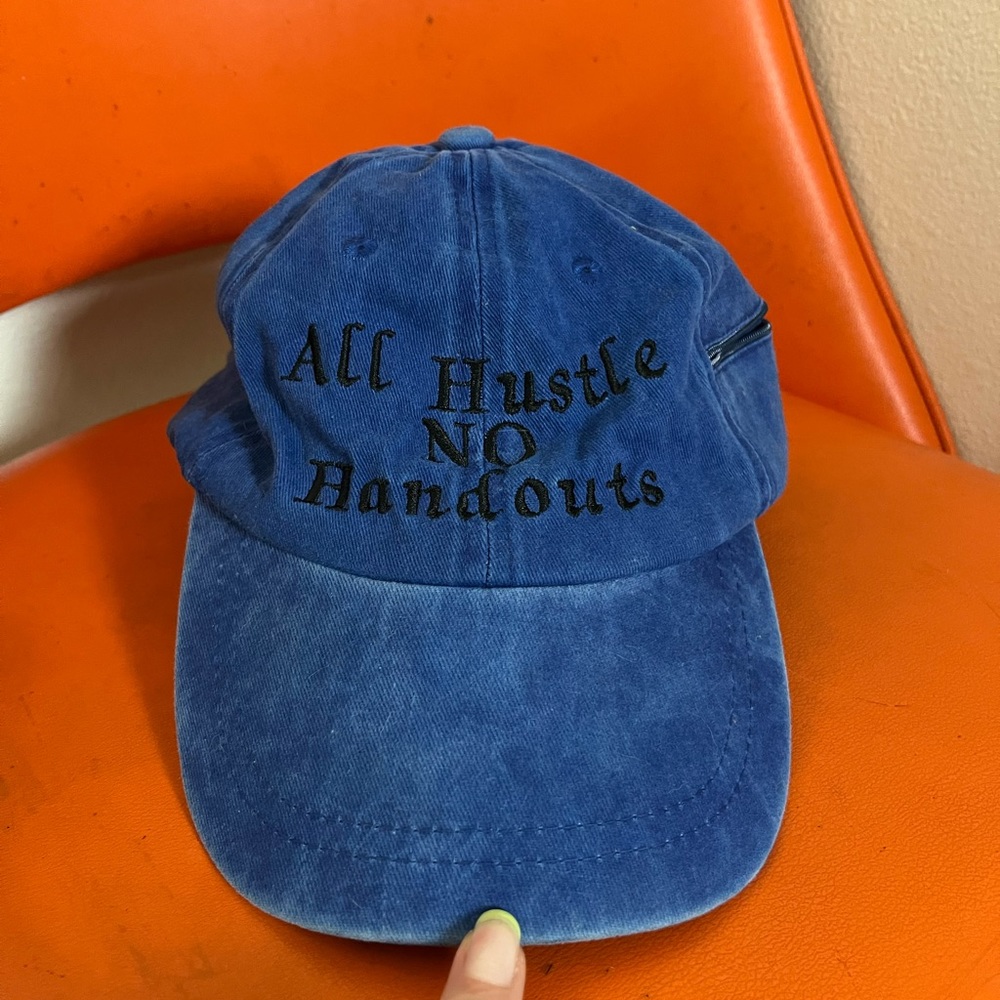 Blue faded design cap with a tiny pocket